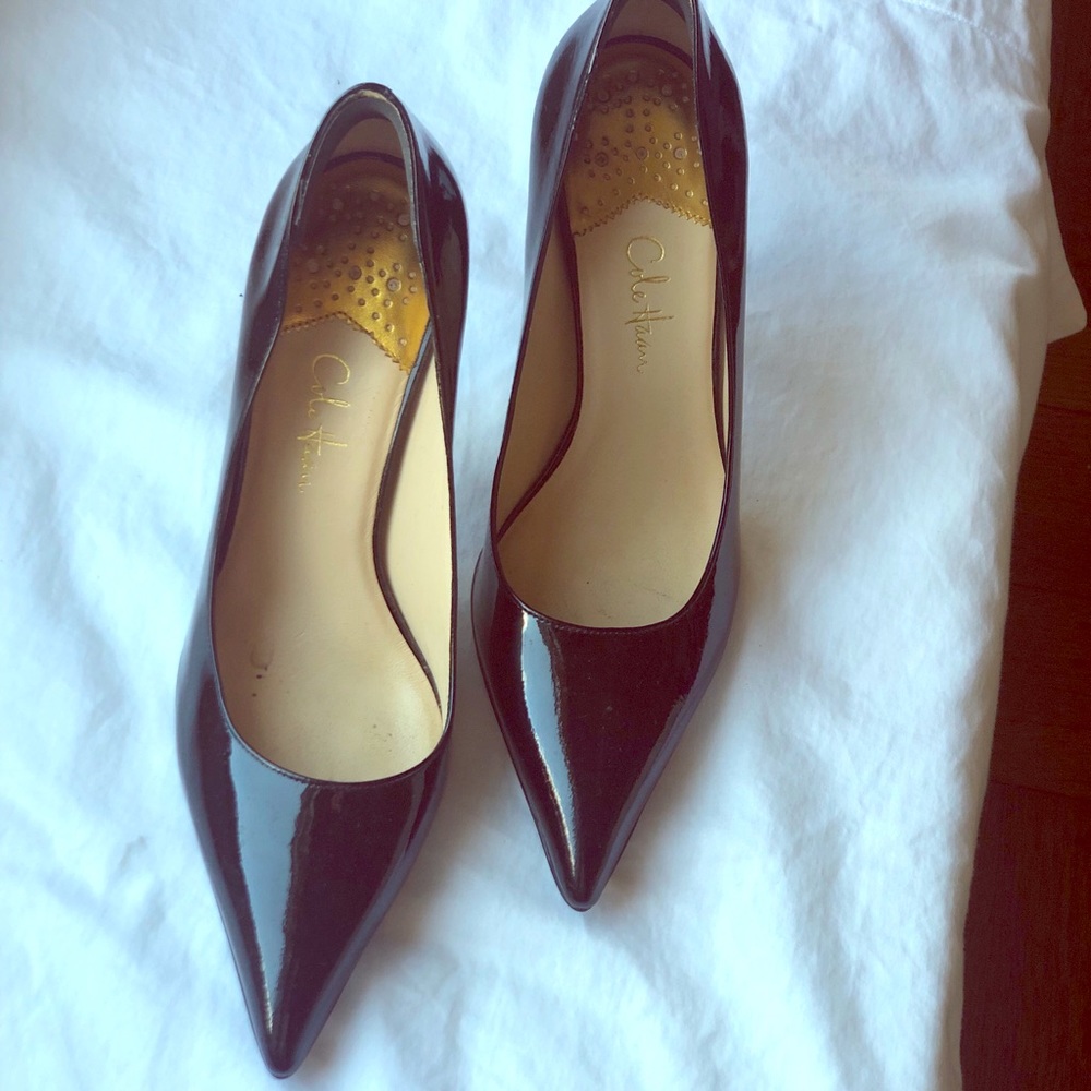 Cole Haan Nike air pumps in black.